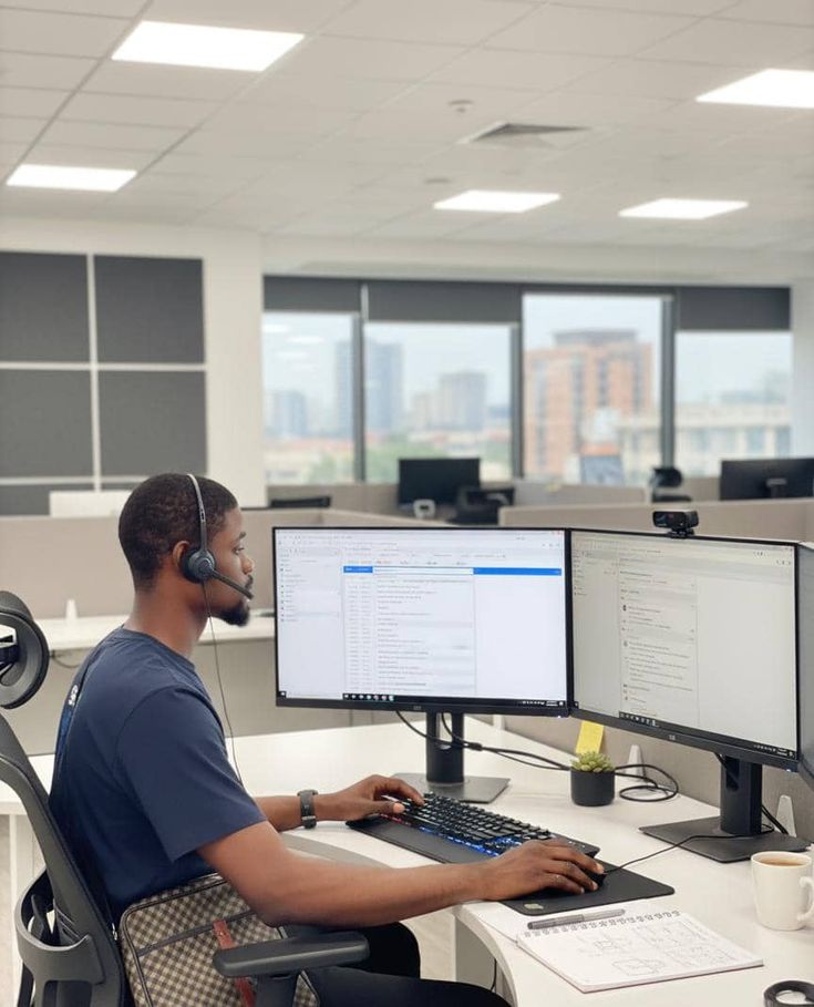 Managed IT support professional at a workstation